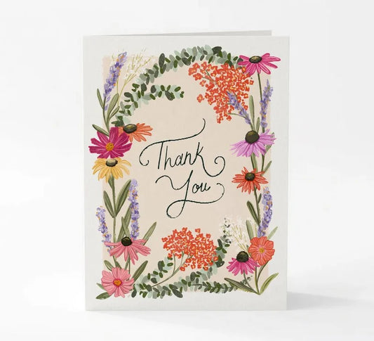 Greeting card with floral design and 'Thank You' text on a white background