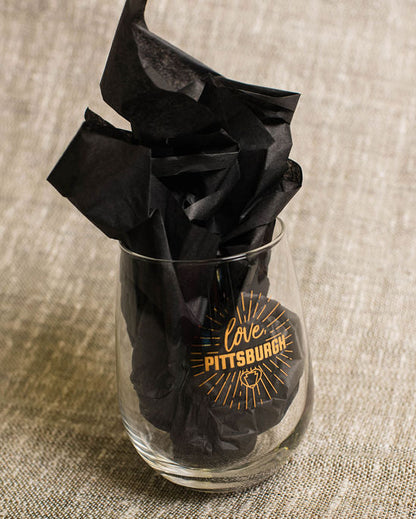 clear wine glass with black tissue