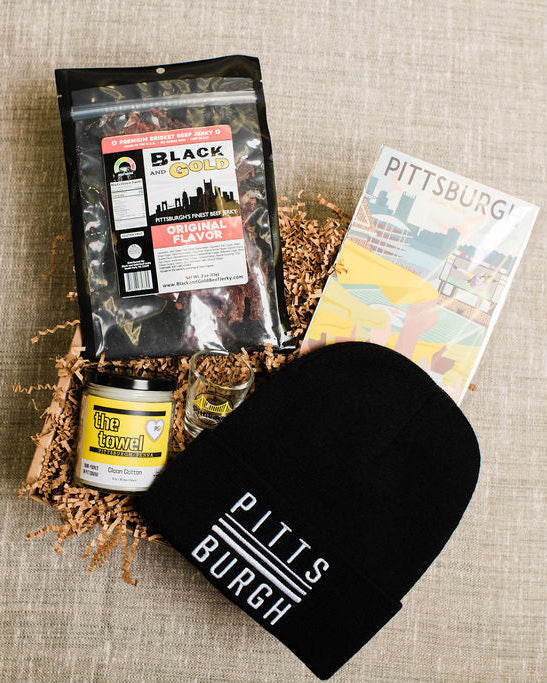 steelers friendly Gift box with renegade theme items on a textured surface.