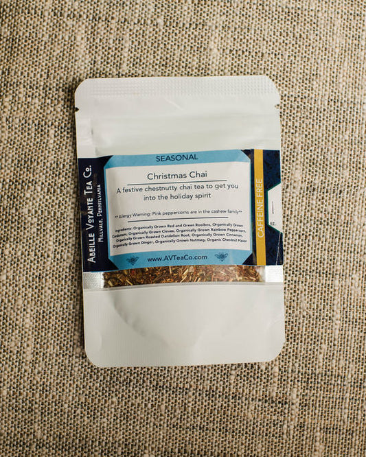 christmas chai Tea package with a label on a textured fabric background