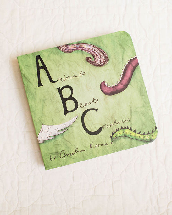 Children's book titled 'Animals ABC' on a light background