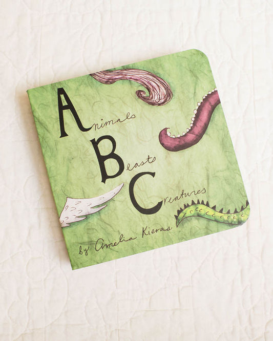 Children's book titled 'Animals ABC' on a light background